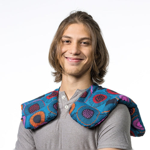 Ex-large shoulder and upper back heat pack worn over a t-shirt